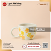 Tách sứ quai tròn họa bông vàng